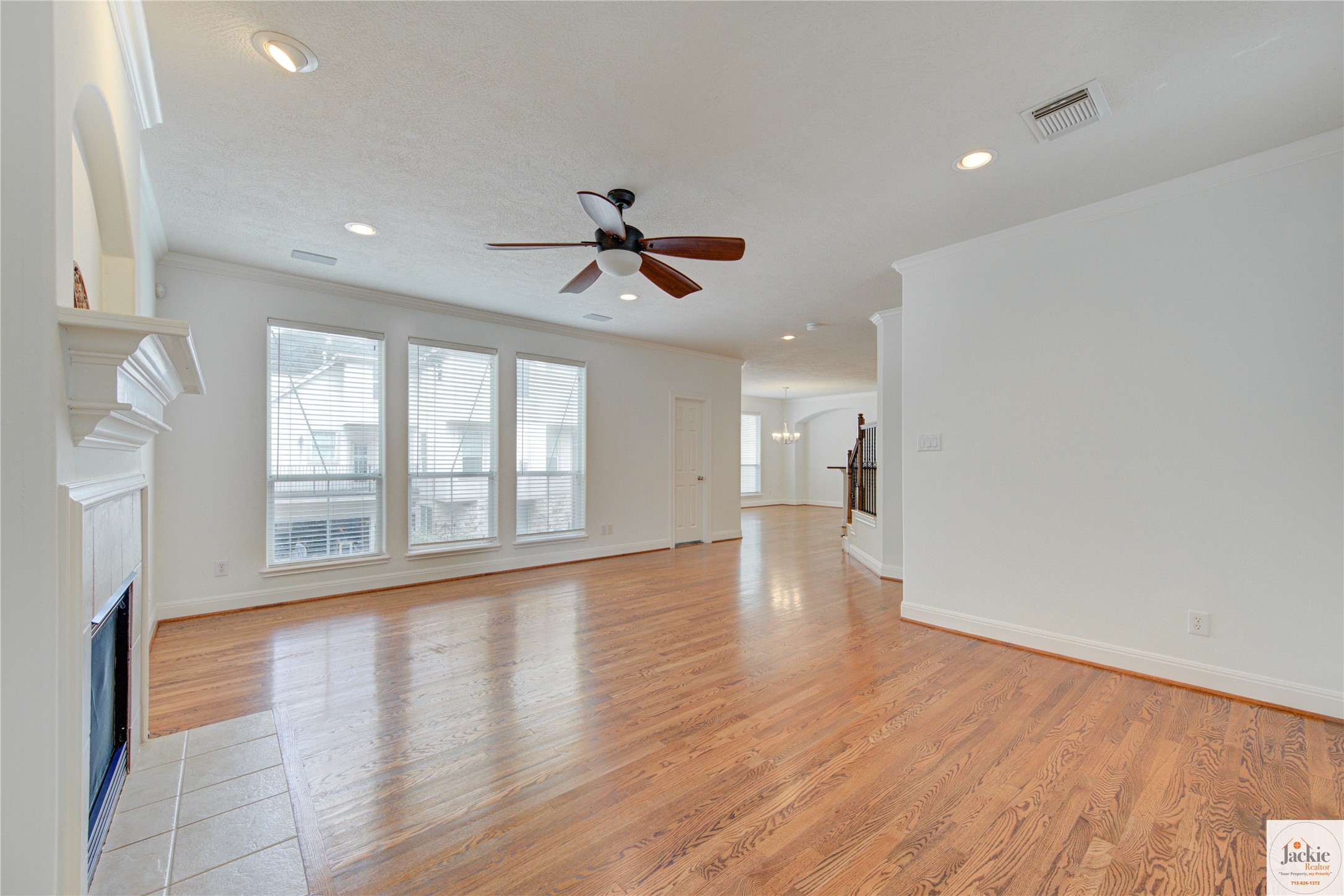 1322 Cohn Street Houston, TX 77007 - Photo 16 of 30 a view of an empty room with a window and wooden floor