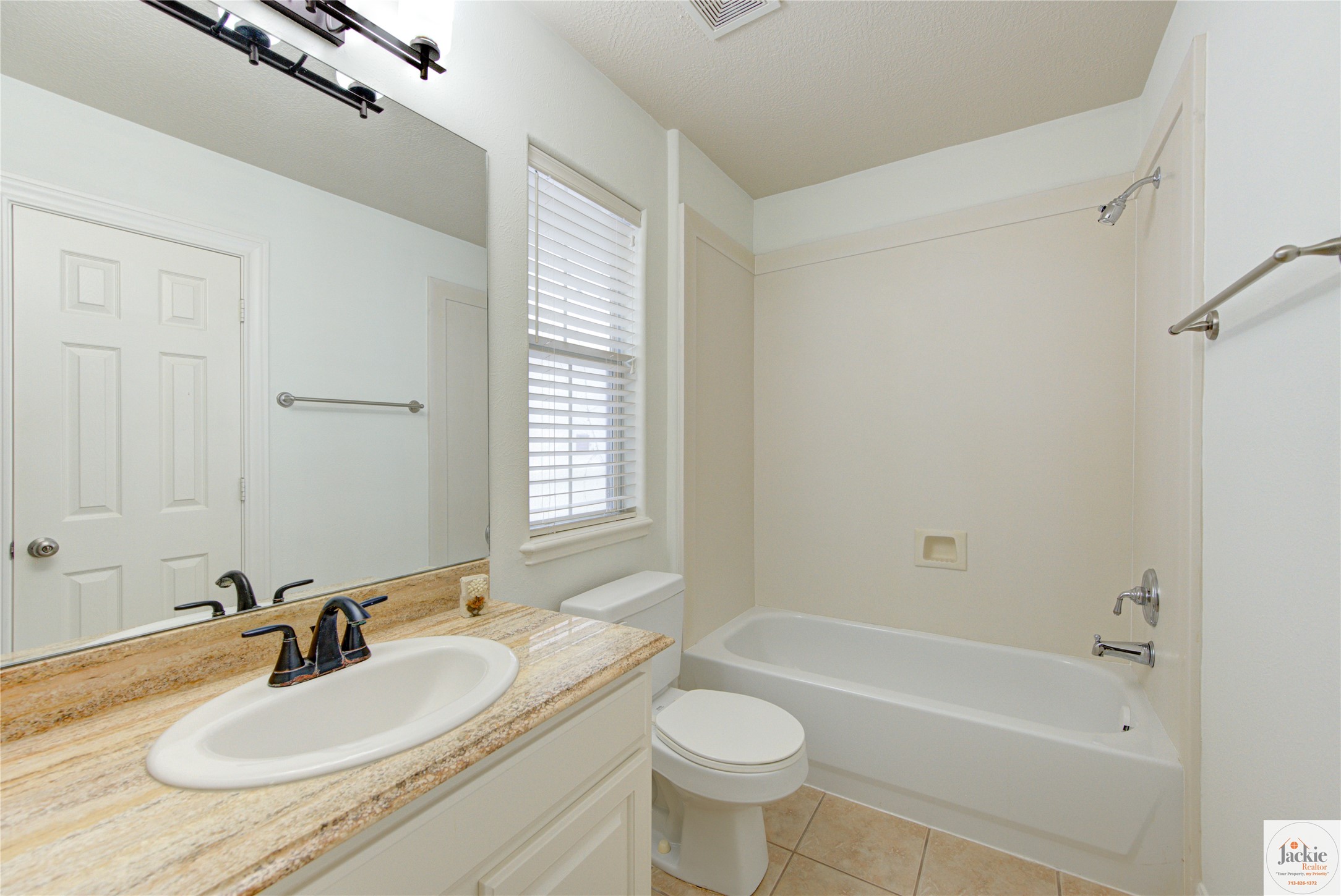 1322 Cohn Street Houston, TX 77007 - Photo 29 of 30 a bathroom with a sink and a mirror