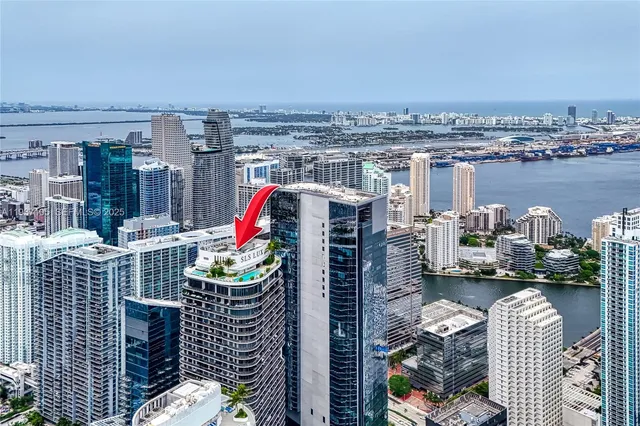 a front view of house with outdoor space and swimming pool