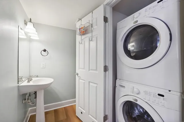 a bathroom with a sink a mirror and vanity