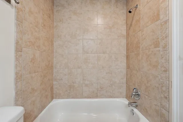 a bathroom with a bathtub