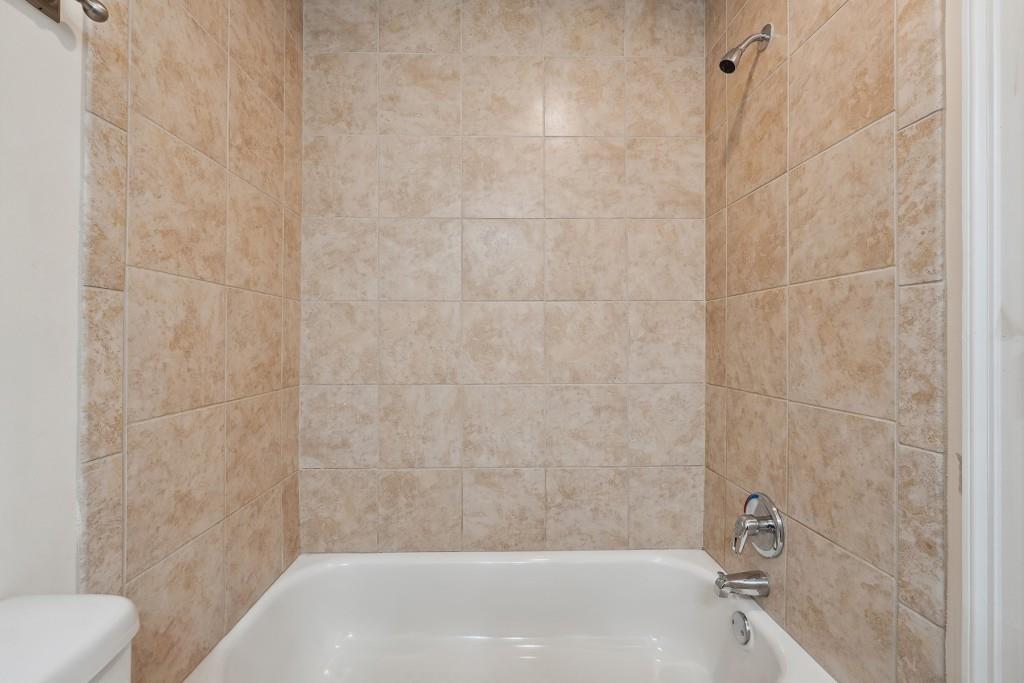 104 Rondak Circle Smyrna, GA 30080 - Photo 20 of 33 a bathroom with a bathtub