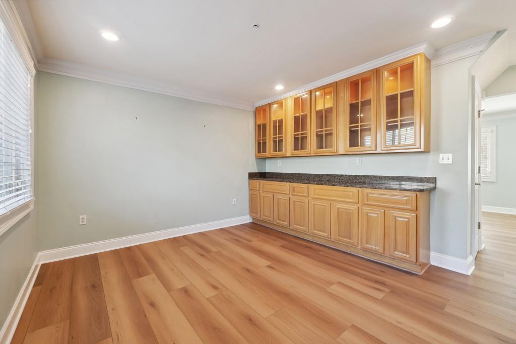 104 Rondak Circle Smyrna, GA 30080 - Photo 2 of 33 a view of an empty room with wooden floor and a window