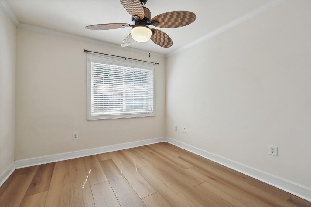 104 Rondak Circle Smyrna, GA 30080 - Photo 22 of 33 wooden floor in an empty room with a window