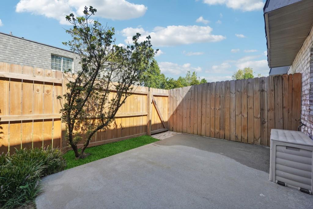 104 Rondak Circle Smyrna, GA 30080 - Photo 4 of 33 a view of backyard with wooden fence