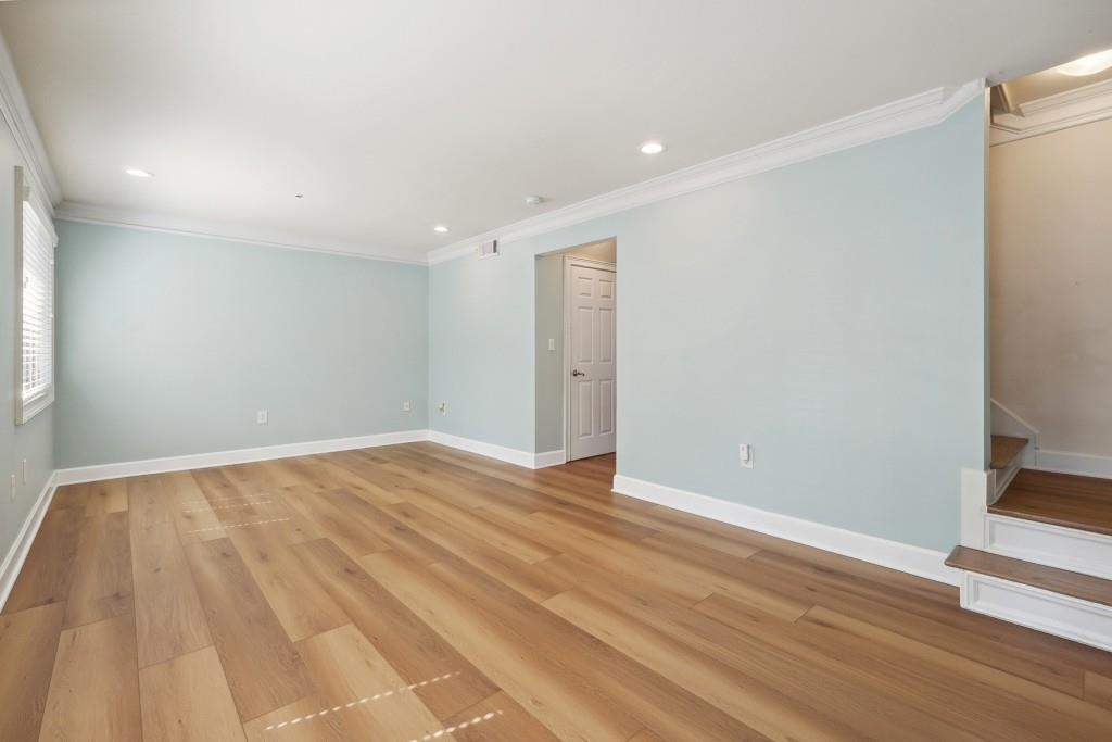 104 Rondak Circle Smyrna, GA 30080 - Photo 8 of 33 a view of empty room with wooden floor