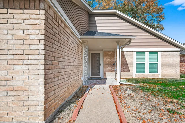 a view of a small space with wooden floor