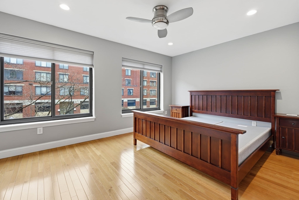 85 Brainerd Road, Unit TH7 Boston, MA 02134 - Photo 16 of 41 a view of bedroom with furniture and balcony
