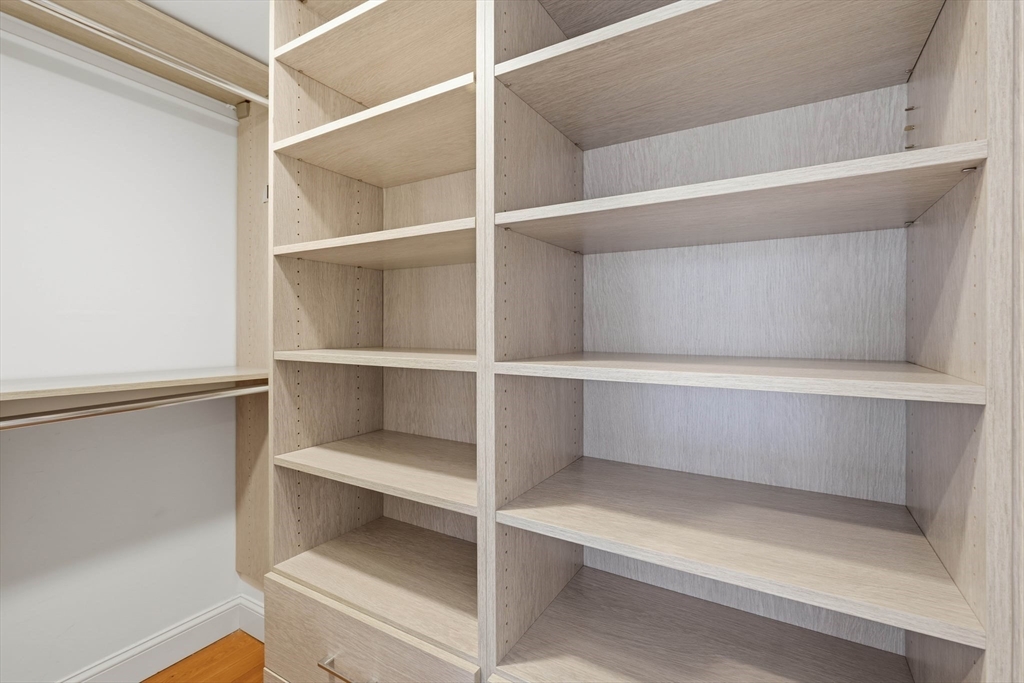85 Brainerd Road, Unit TH7 Boston, MA 02134 - Photo 18 of 41 a view of an empty walk in closet