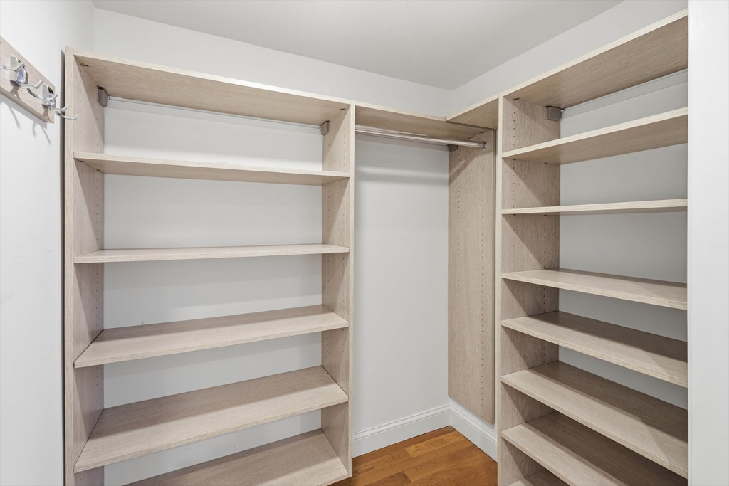 85 Brainerd Road, Unit TH7 Boston, MA 02134 - Photo 21 of 41 a view of walk in closet with empty racks