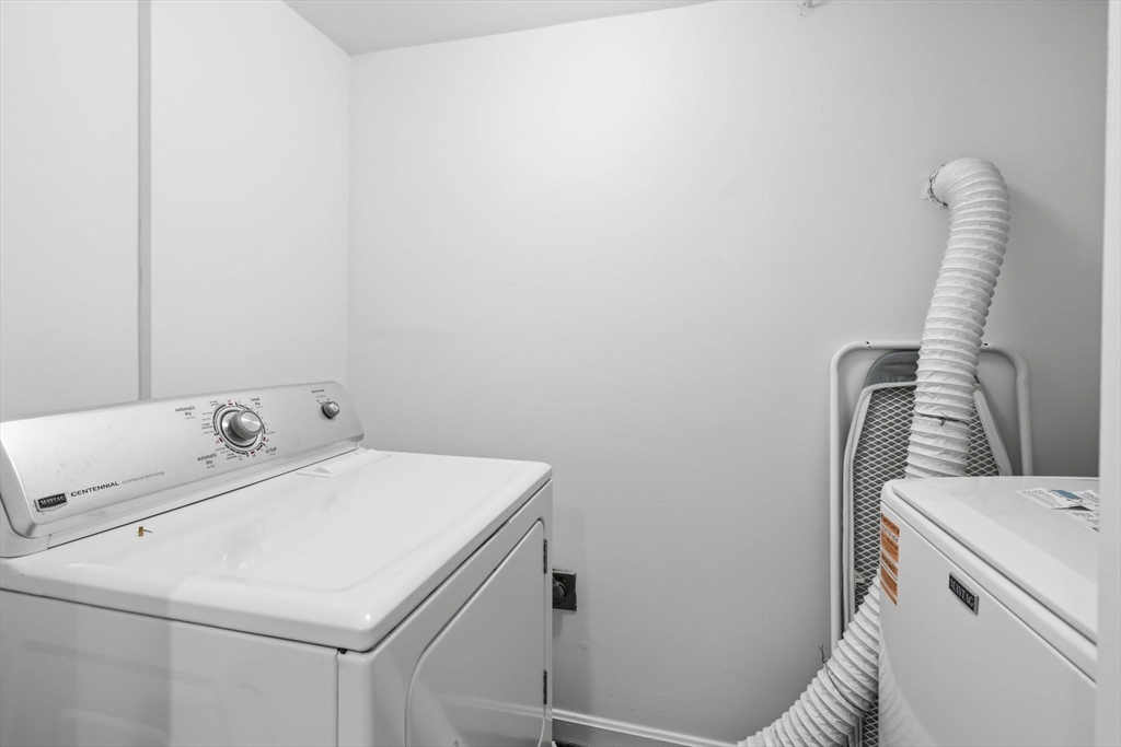 85 Brainerd Road, Unit TH7 Boston, MA 02134 - Photo 23 of 41 a utility room with dryer and washer