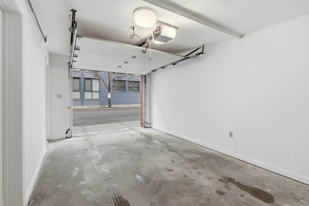 85 Brainerd Road, Unit TH7 Boston, MA 02134 - Photo 29 of 41 a view of a livingroom with a fireplace