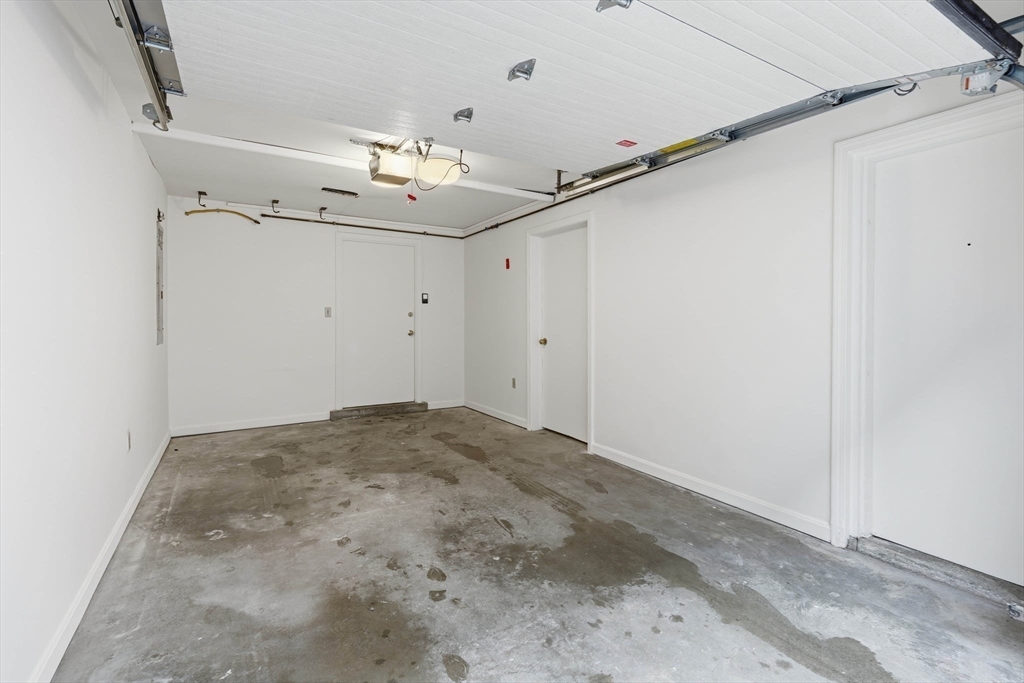 85 Brainerd Road, Unit TH7 Boston, MA 02134 - Photo 30 of 41 a view of a hallway with a ceiling fan