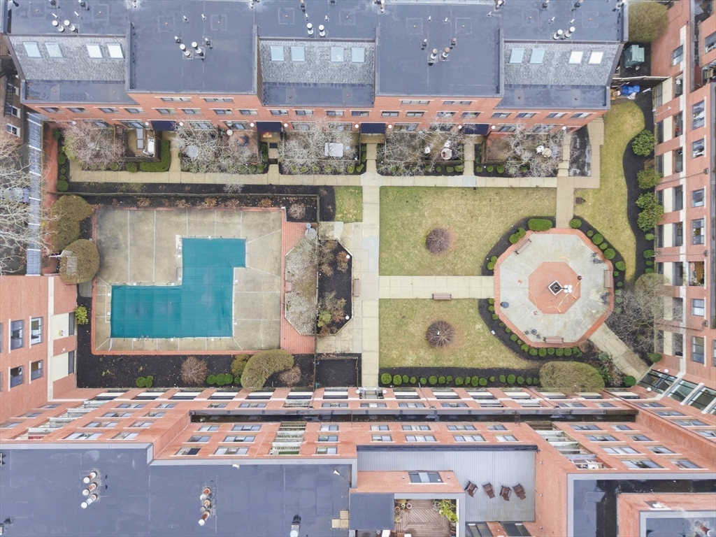 85 Brainerd Road, Unit TH7 Boston, MA 02134 - Photo 32 of 41 an aerial view of a couch and a fountain