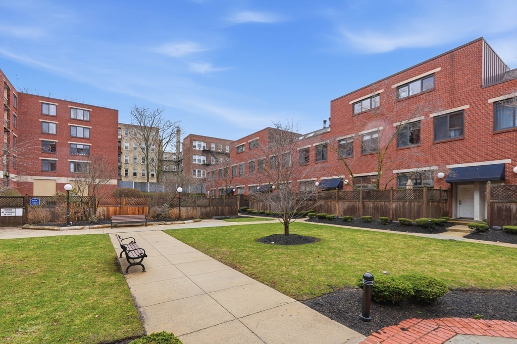 85 Brainerd Road, Unit TH7 Boston, MA 02134 - Photo 36 of 41 a view of a city with tall buildings