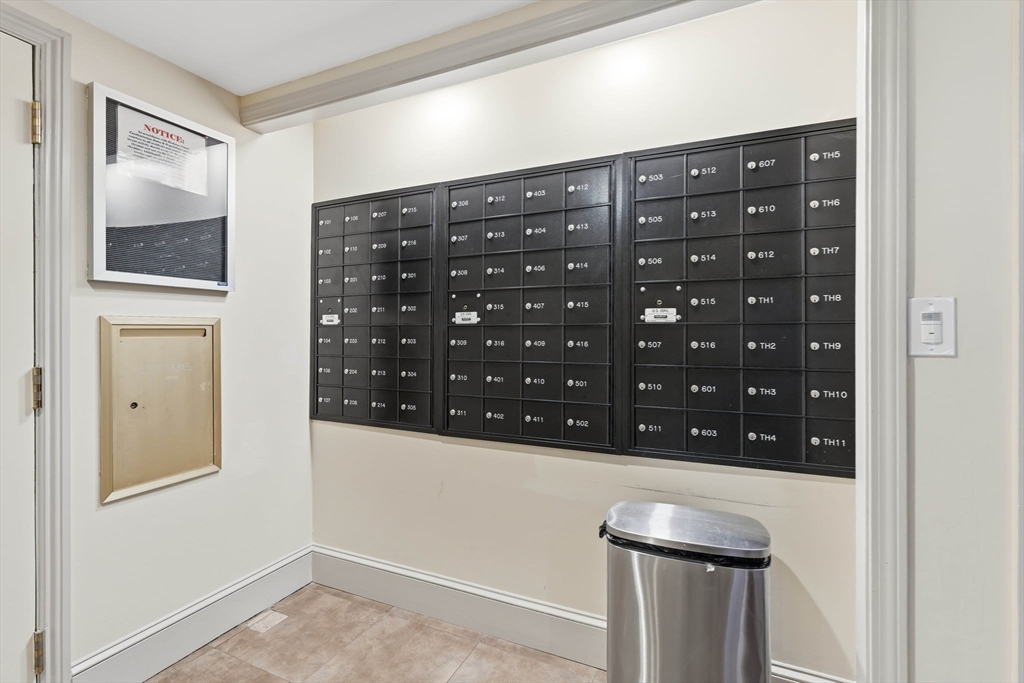 85 Brainerd Road, Unit TH7 Boston, MA 02134 - Photo 41 of 41 a view of wooden cabinets and entryway