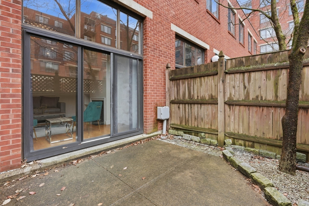 85 Brainerd Road, Unit TH7 Boston, MA 02134 - Photo 7 of 41 a view of a house with a outdoor space