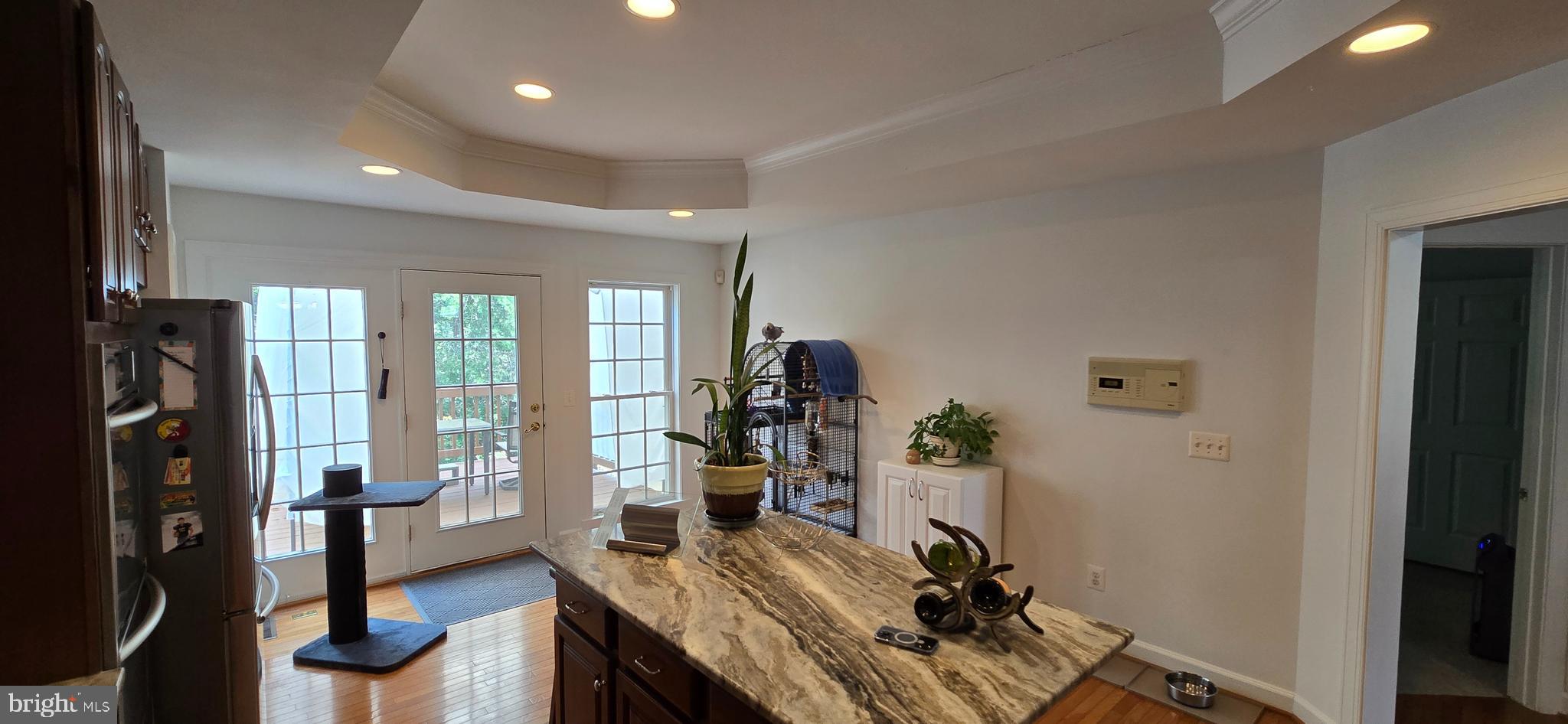 7357 Cluster House Way Gainesville, VA 20155 - Photo 12 of 28 a view of a livingroom with furniture and a flat screen tv
