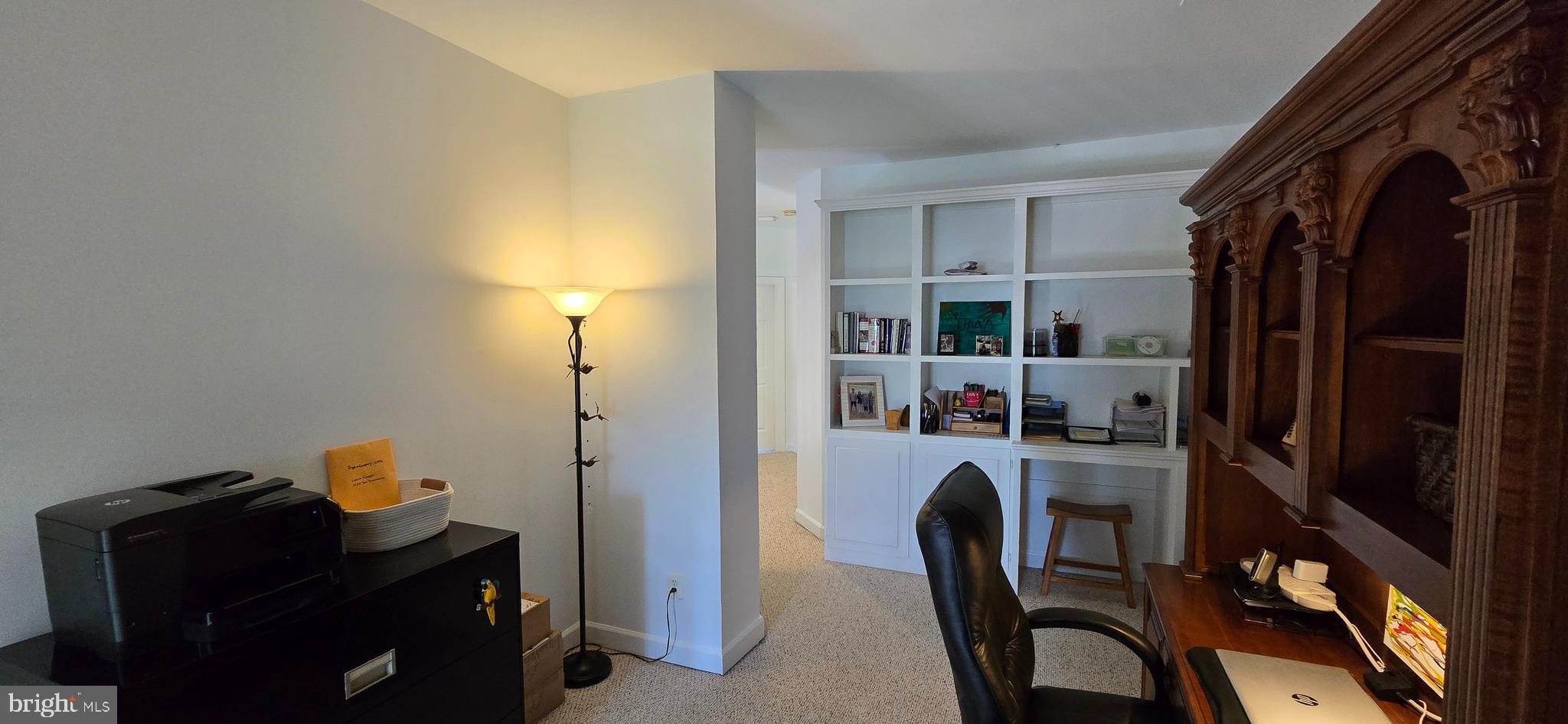 7357 Cluster House Way Gainesville, VA 20155 - Photo 20 of 28 a view of a workspace with furniture and toys