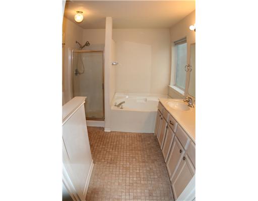 7642 Cold Springs Drive Corpus Christi, TX 78413 - Photo 8 of 10 a bathroom with a sink a toilet and shower