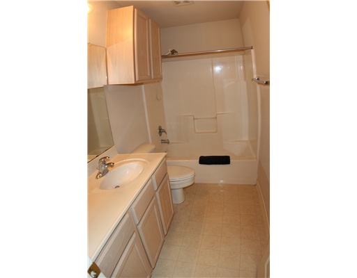 7642 Cold Springs Drive Corpus Christi, TX 78413 - Photo 9 of 10 a bathroom with a sink a toilet and shower