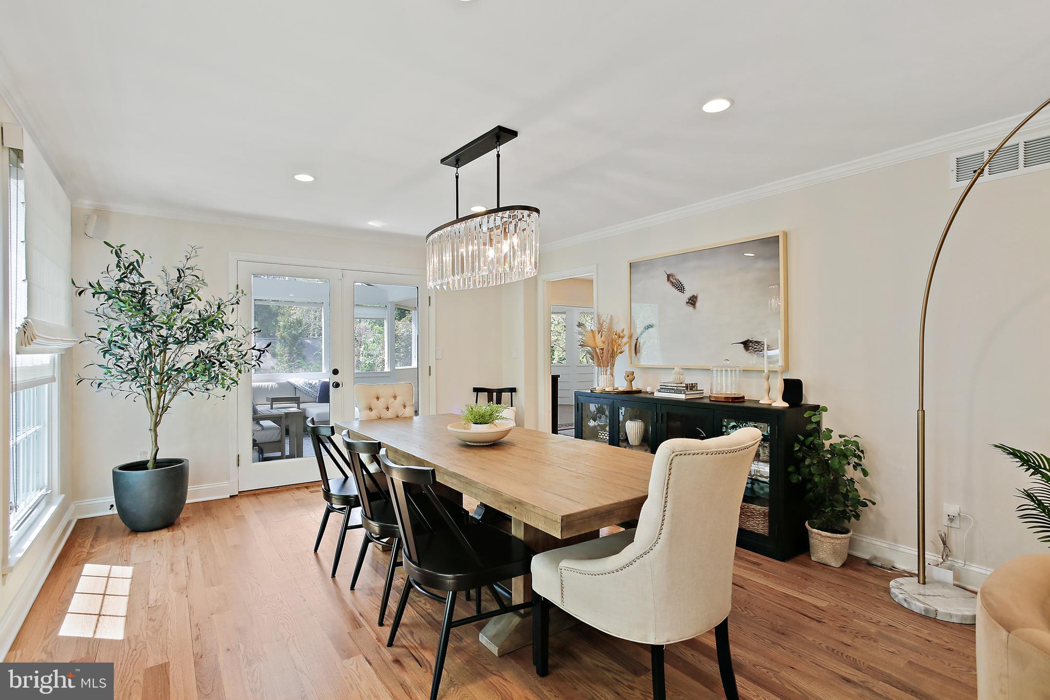 1816 Ruxton Road Baltimore, MD 21204 - Photo 17 of 92 a view of a dining room with furniture and wooden floor