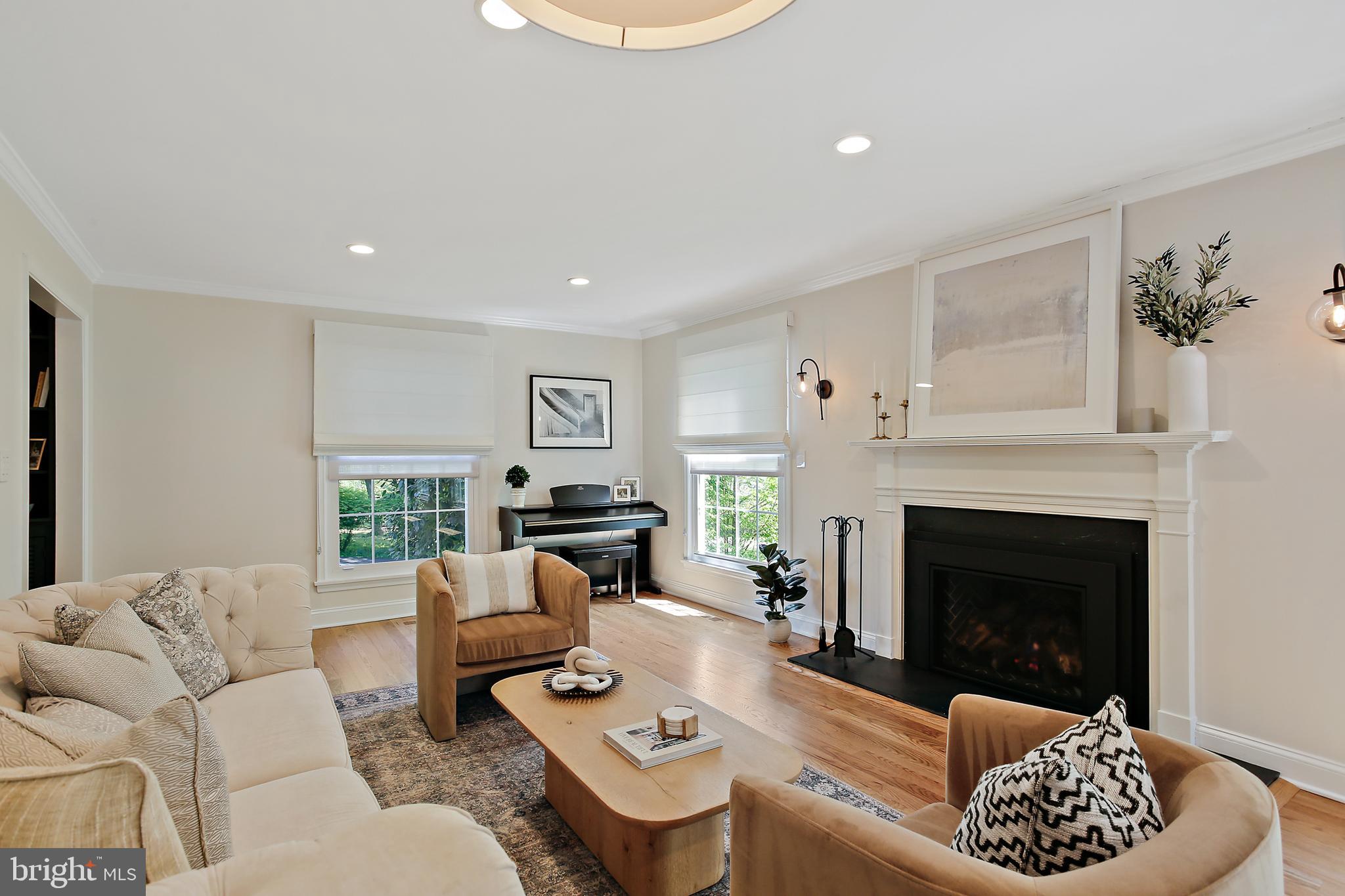 1816 Ruxton Road Baltimore, MD 21204 - Photo 20 of 92 a living room with furniture and a fireplace