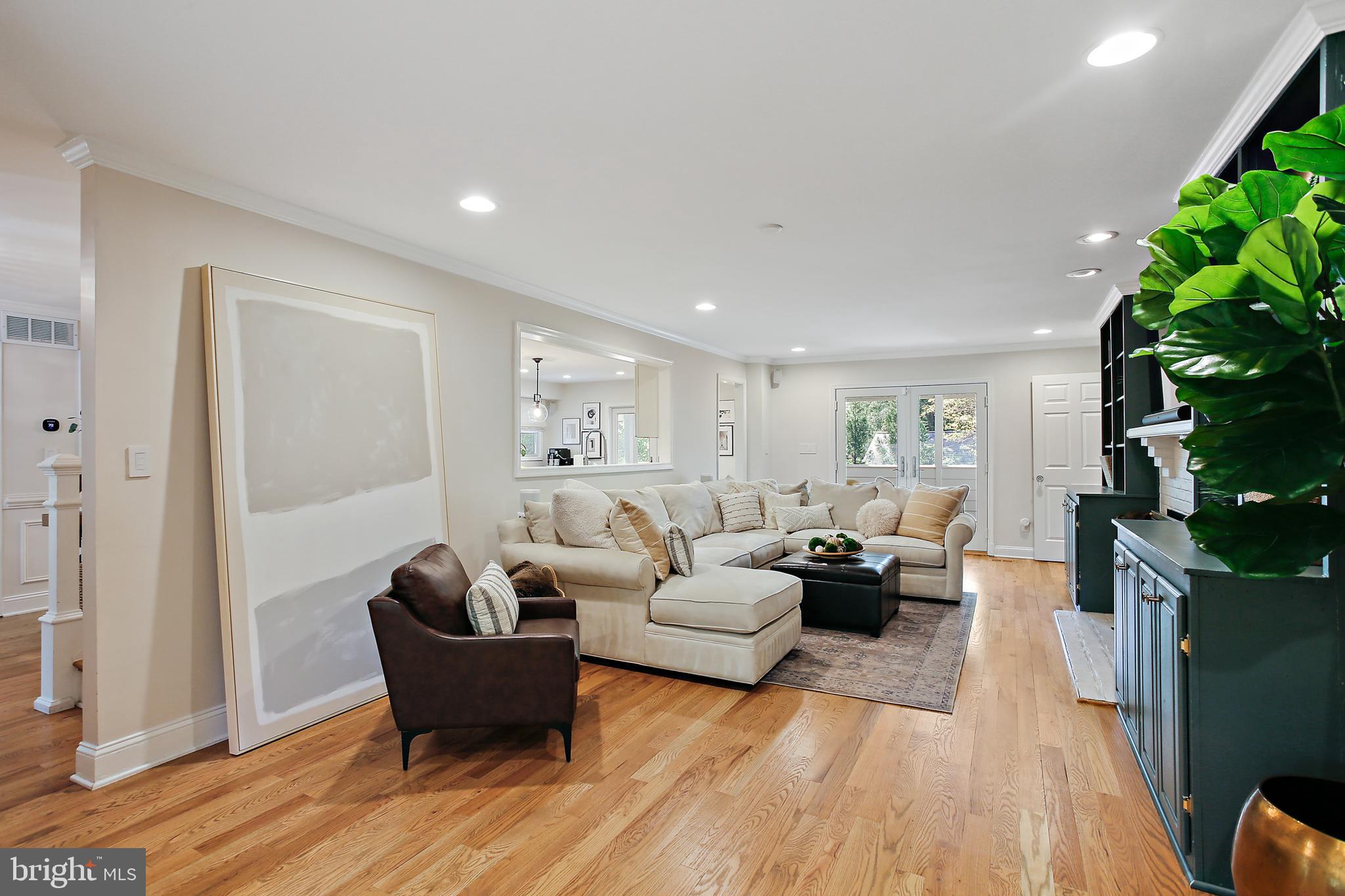 1816 Ruxton Road Baltimore, MD 21204 - Photo 22 of 92 a living room with furniture and a wooden floor