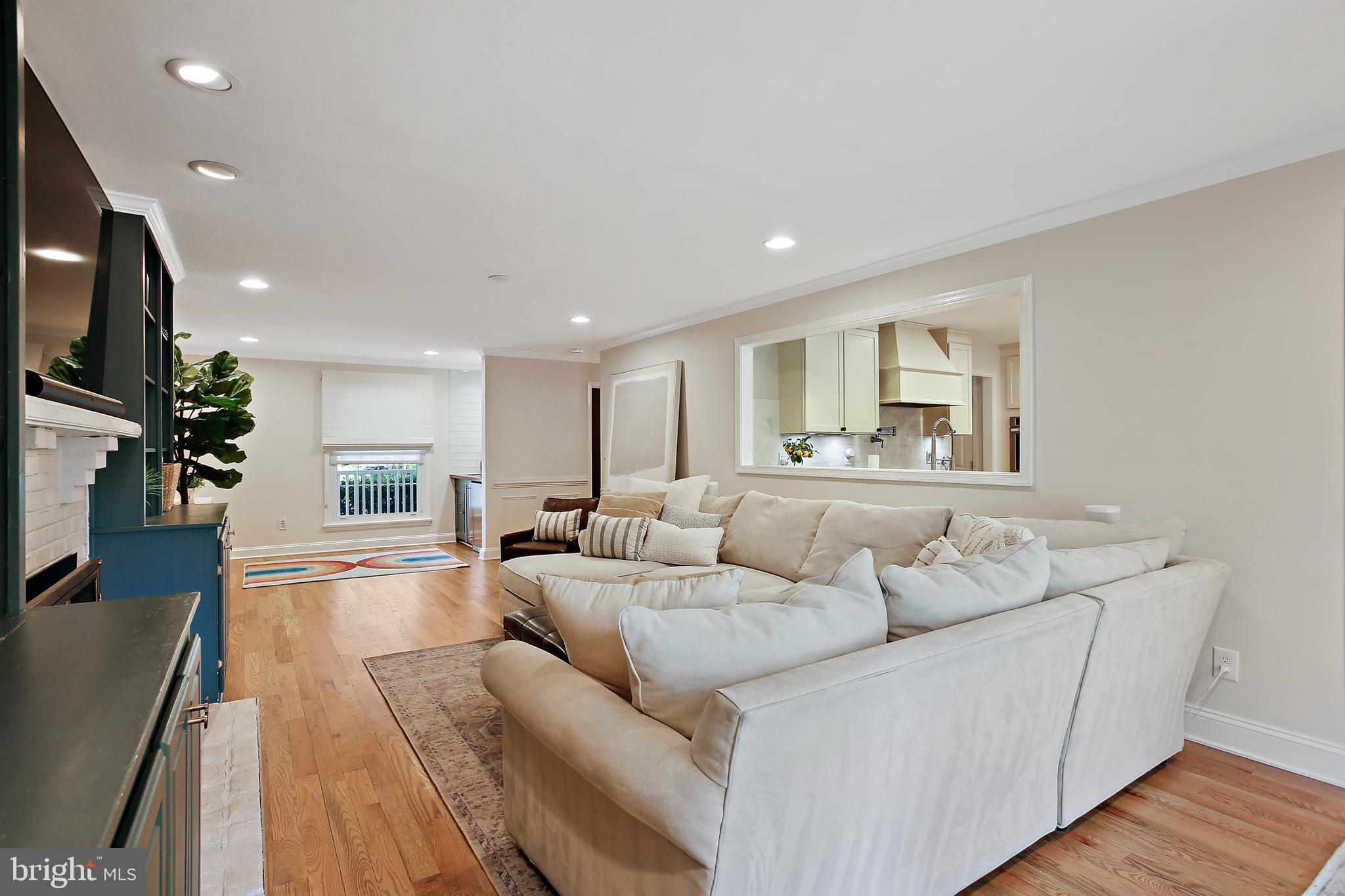 1816 Ruxton Road Baltimore, MD 21204 - Photo 24 of 92 a living room with furniture and a flat screen tv
