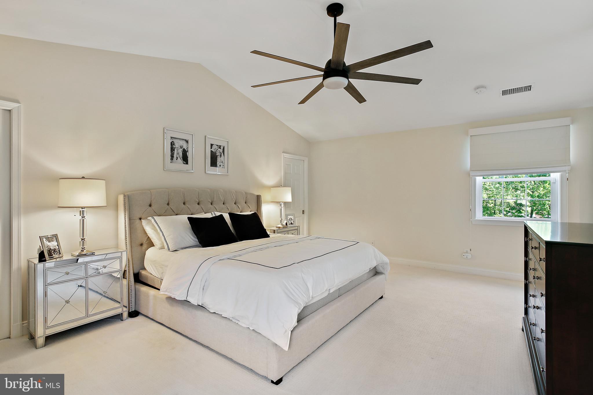 1816 Ruxton Road Baltimore, MD 21204 - Photo 34 of 92 a bedroom with a large bed and a window