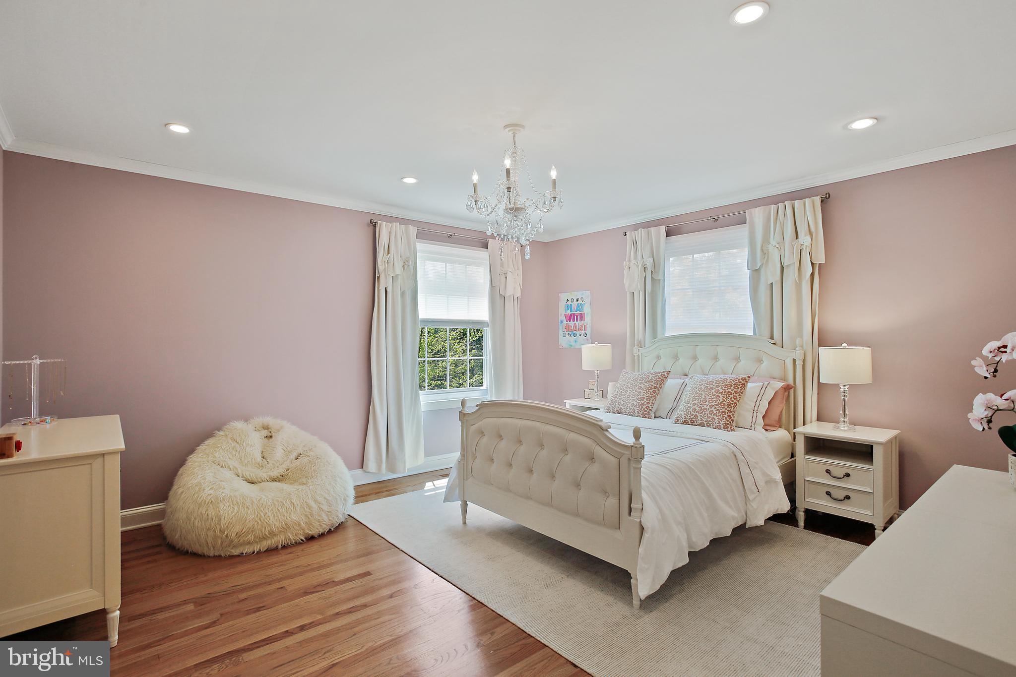 1816 Ruxton Road Baltimore, MD 21204 - Photo 38 of 92 a spacious bedroom with a bed and a window