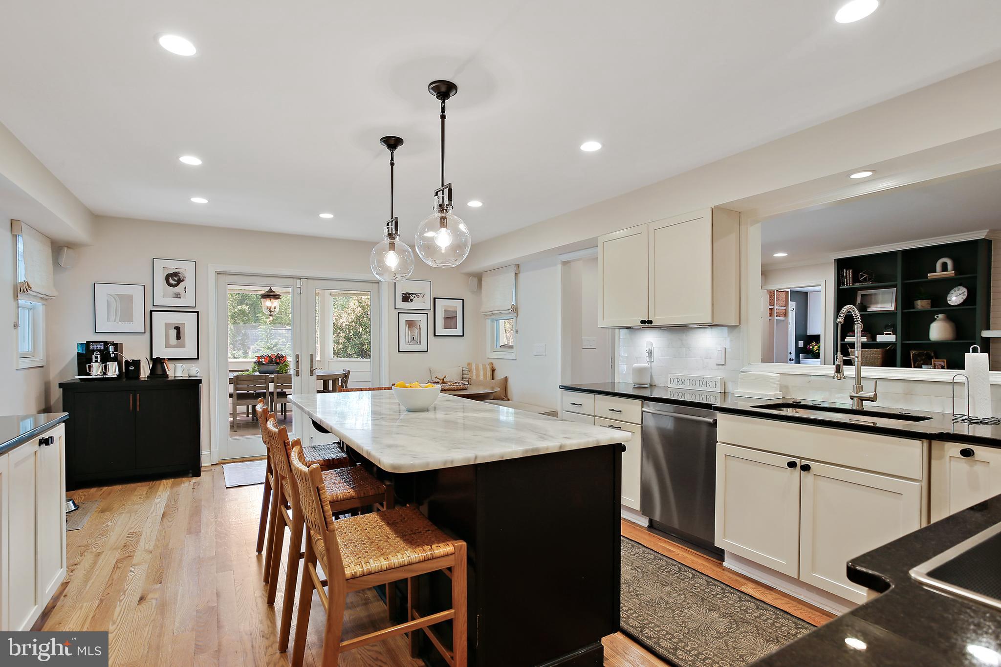1816 Ruxton Road Baltimore, MD 21204 - Photo 7 of 92 a large kitchen with a table and chairs