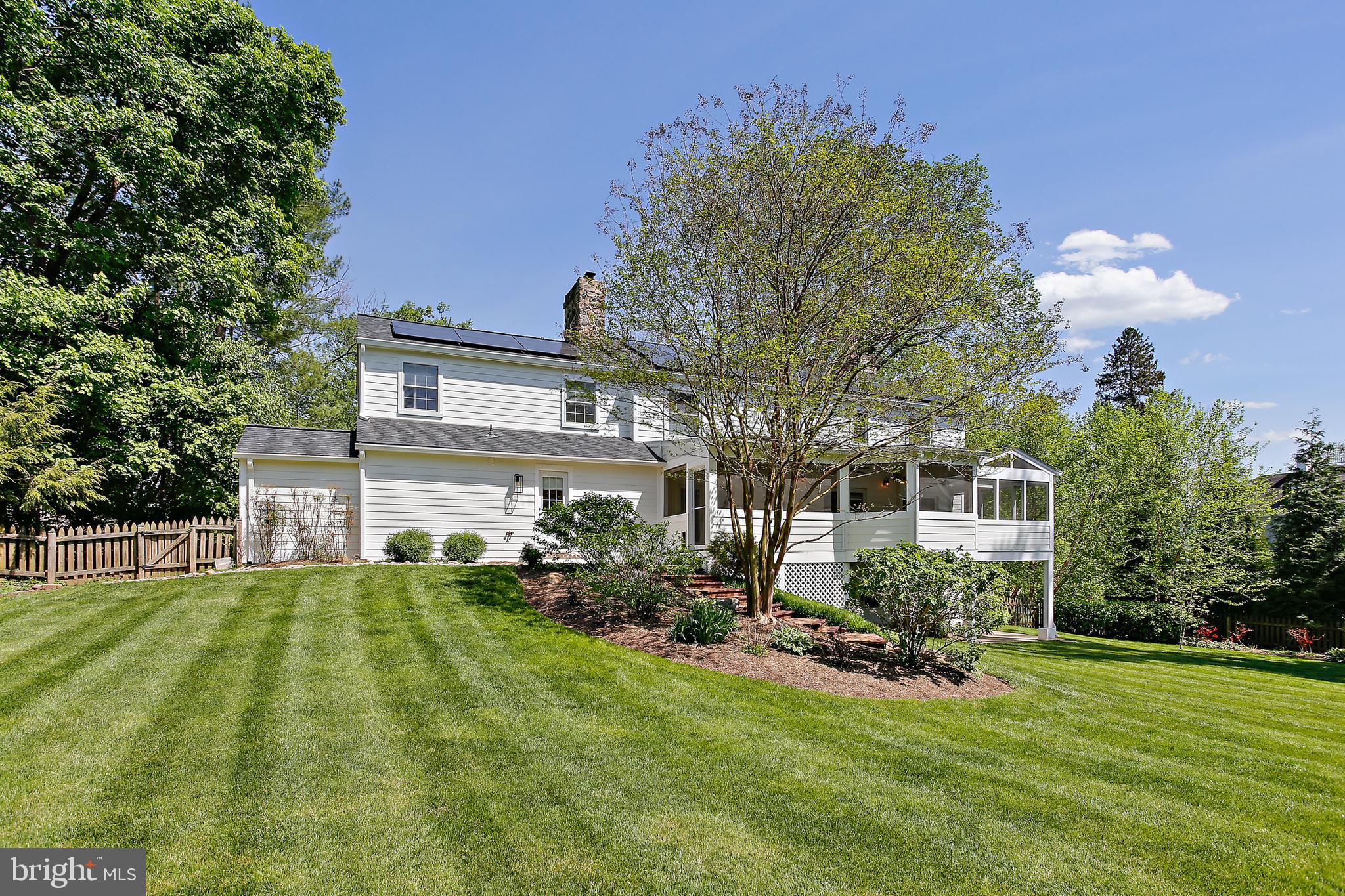 1816 Ruxton Road Baltimore, MD 21204 - Photo 73 of 92 a view of a house with a big yard potted plants and large tree