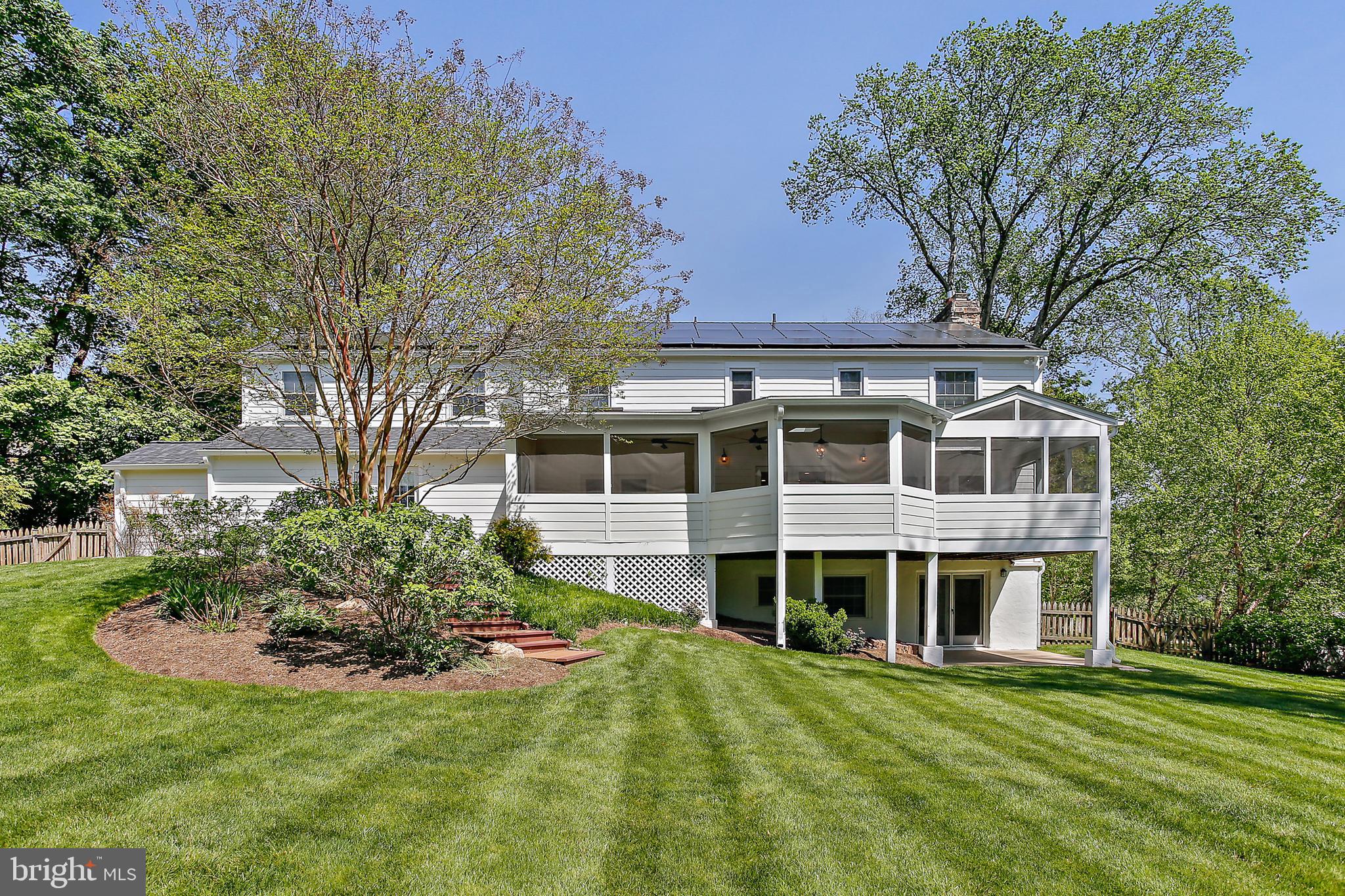 1816 Ruxton Road Baltimore, MD 21204 - Photo 75 of 92 a front view of a house with a garden