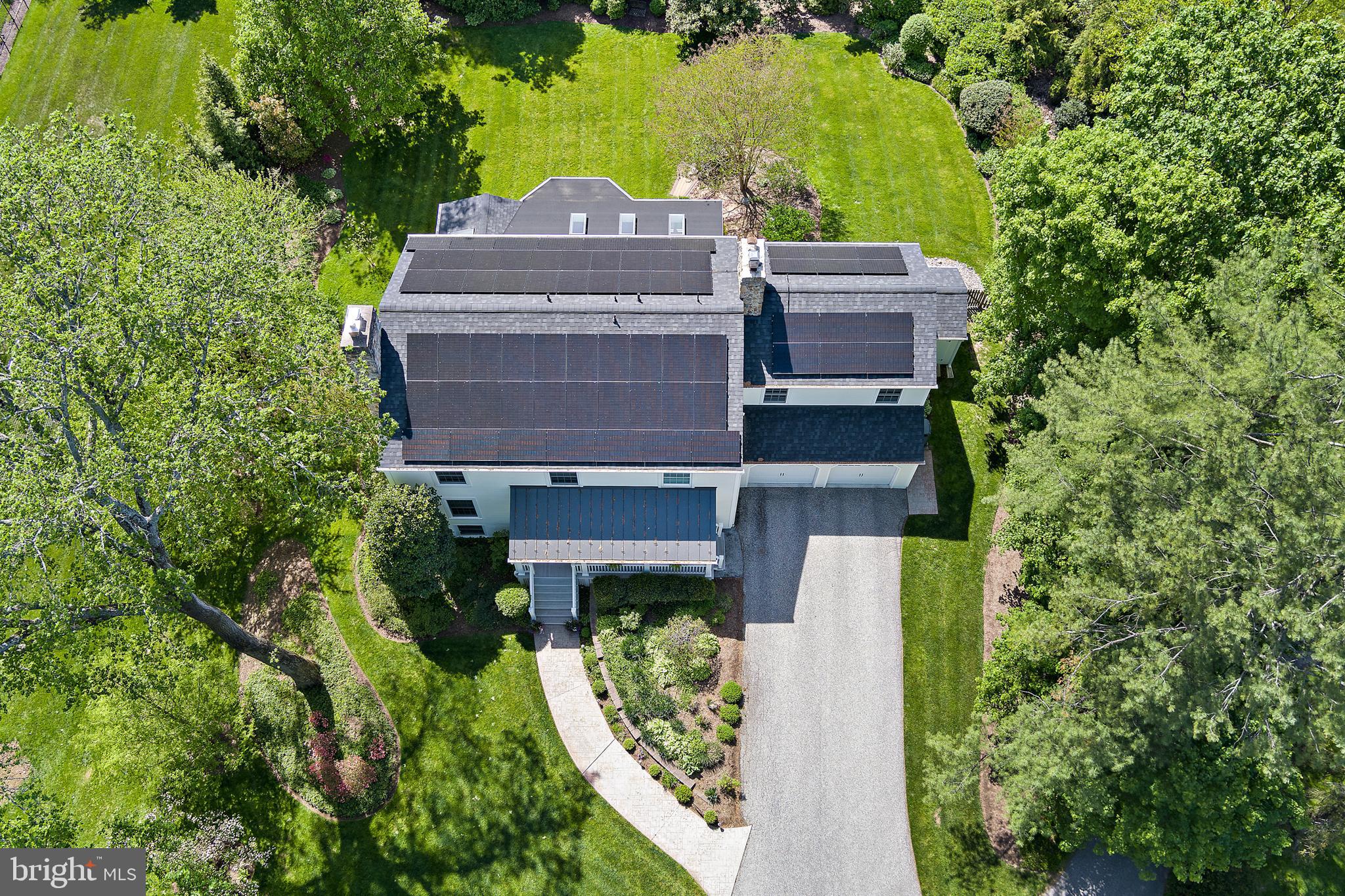 1816 Ruxton Road Baltimore, MD 21204 - Photo 83 of 92 an aerial view of a house with a yard and large trees