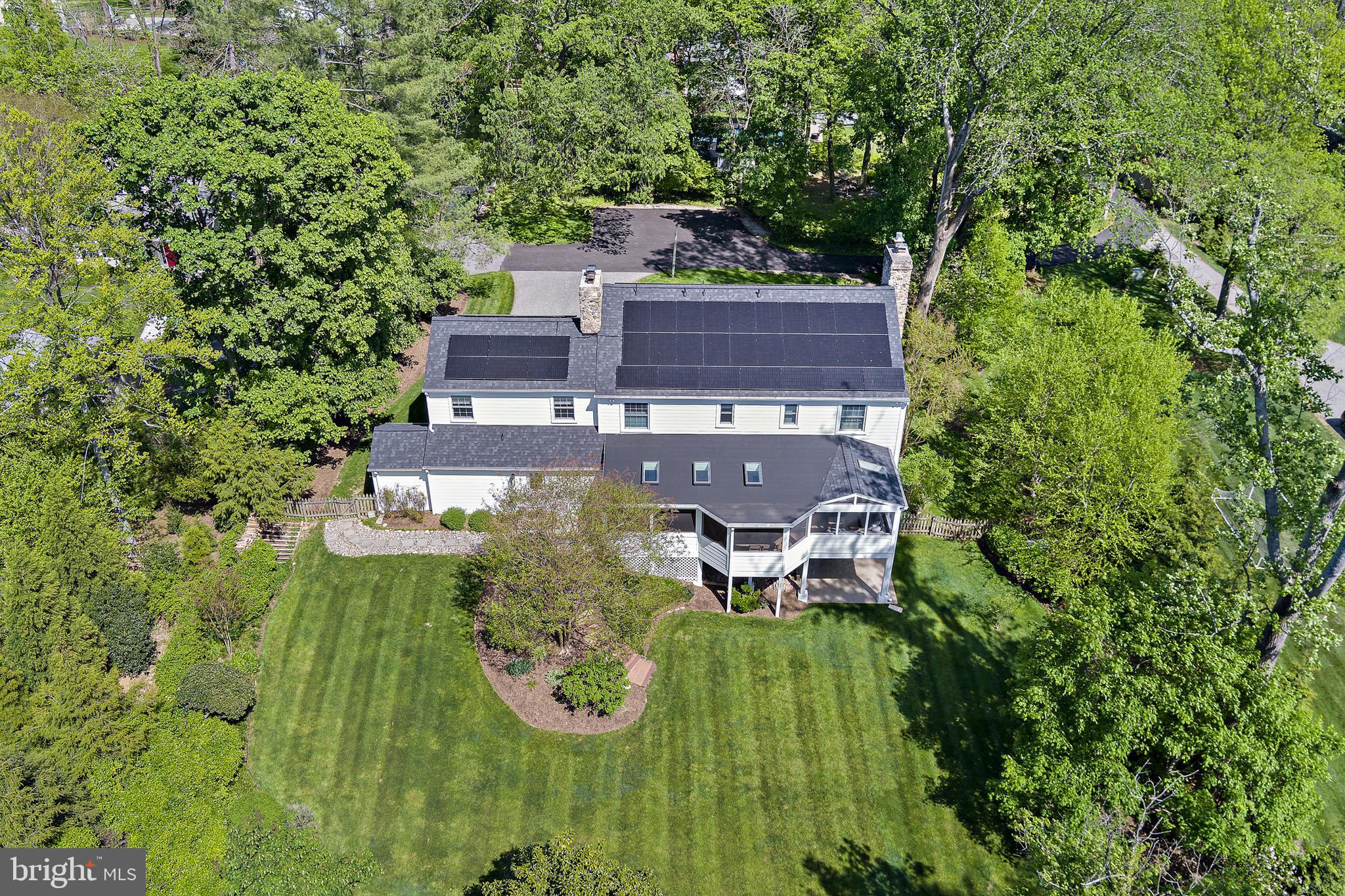 1816 Ruxton Road Baltimore, MD 21204 - Photo 88 of 92 an aerial view of a house with garden space sitting space and trees all around