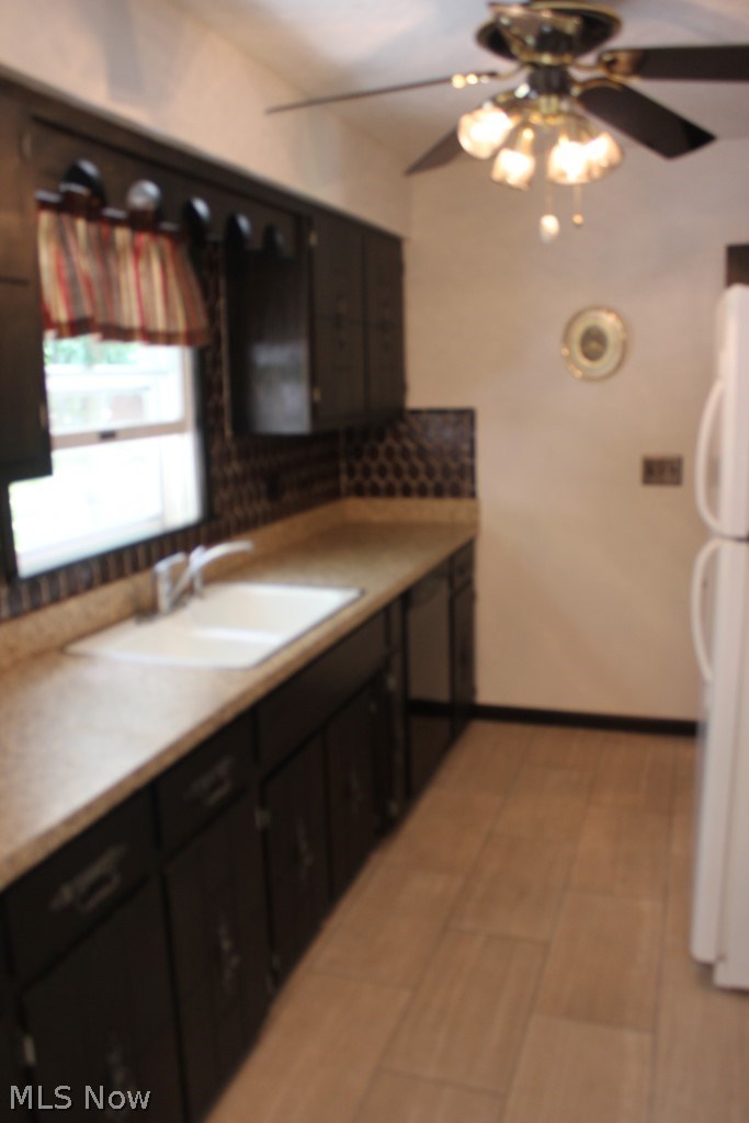 444 Stoner Road Clinton, OH 44216 - Photo 12 of 25 New ceramic floor*