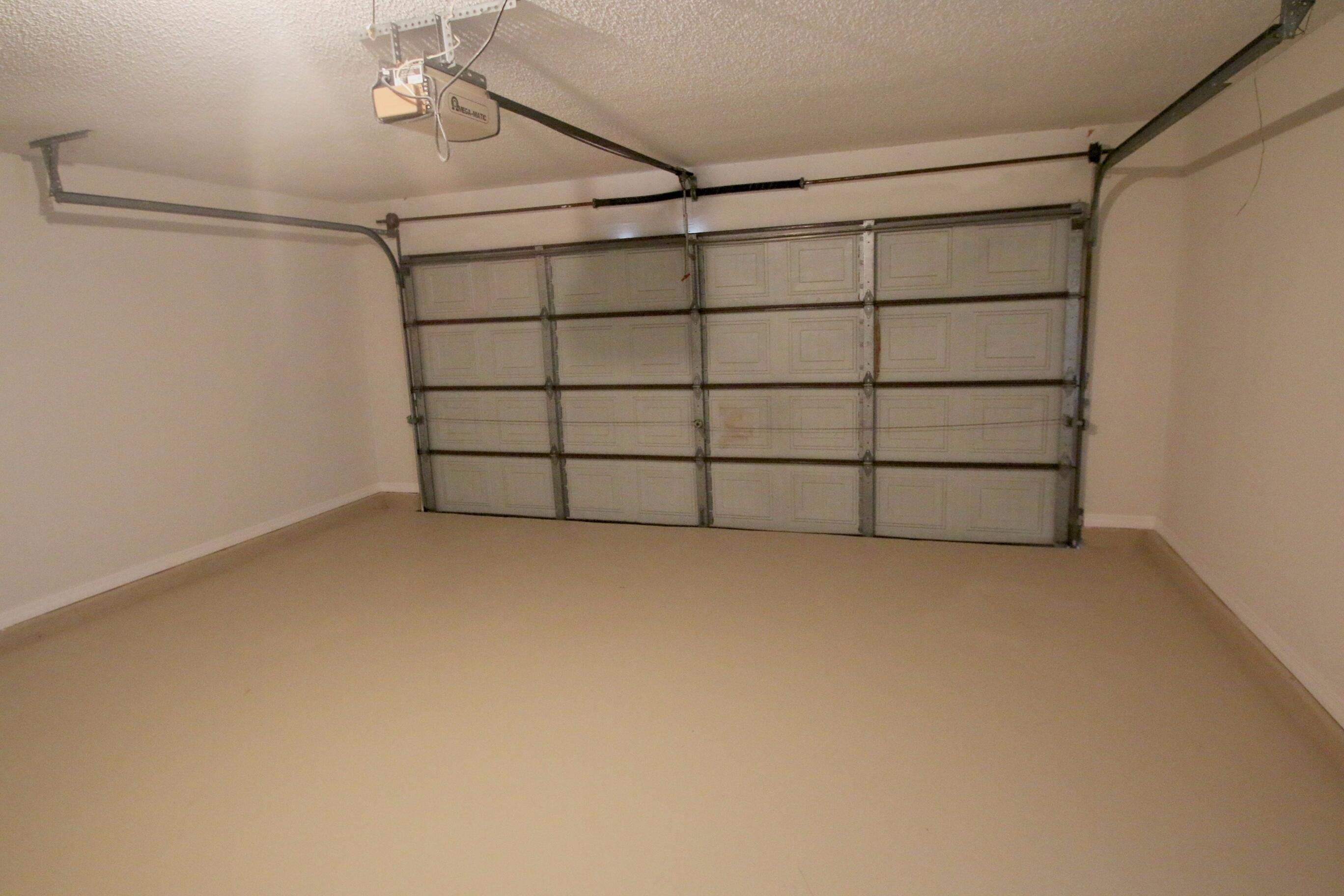 1137 Southwest Estaugh Avenue Port St. Lucie, FL 34953 - Photo 11 of 11 a view of a garage