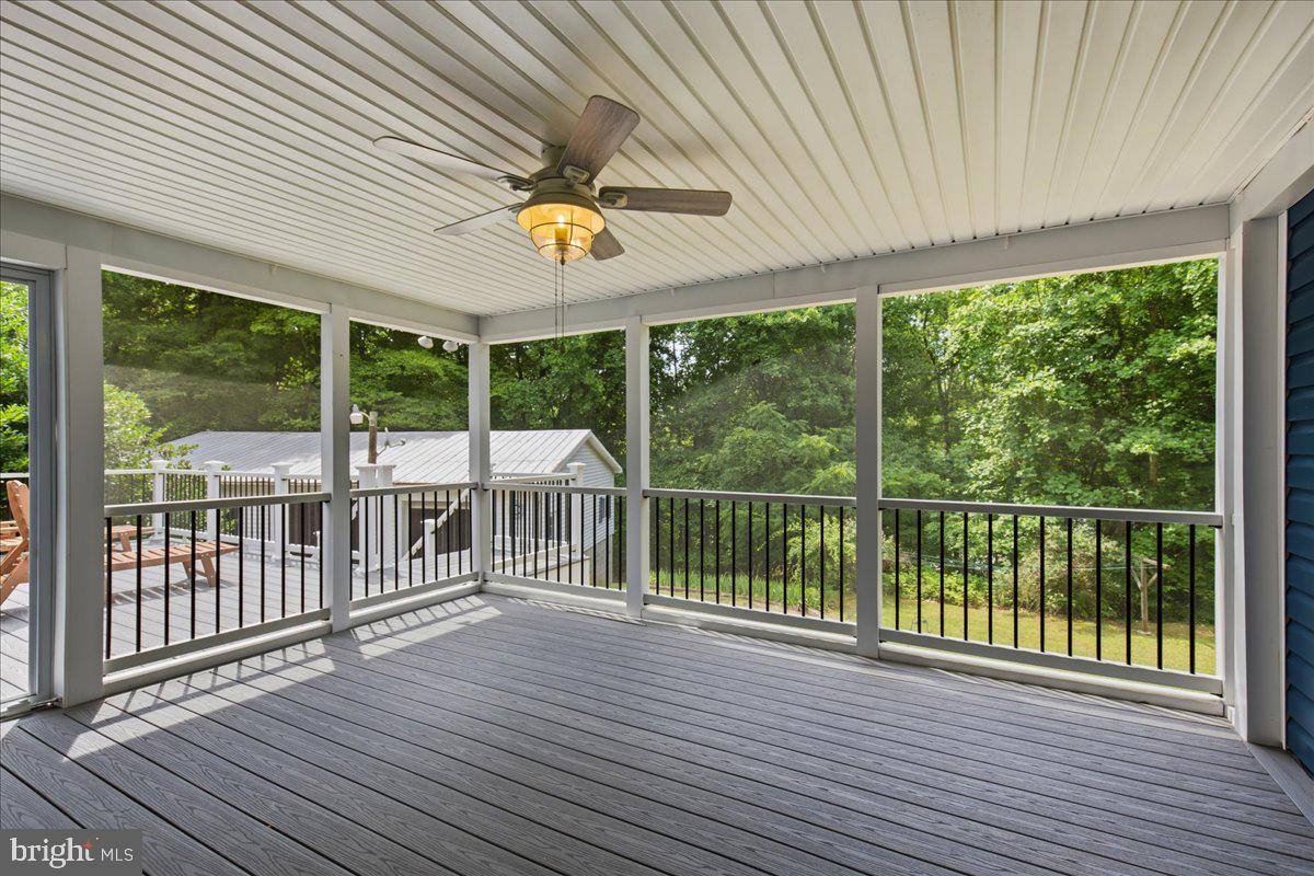 2175 Ponds Wood Road Huntingtown, MD 20639 - Photo 23 of 76 Screened porch overlooks rear yard