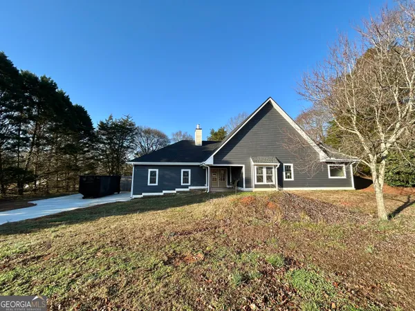 front view of a house with a yard