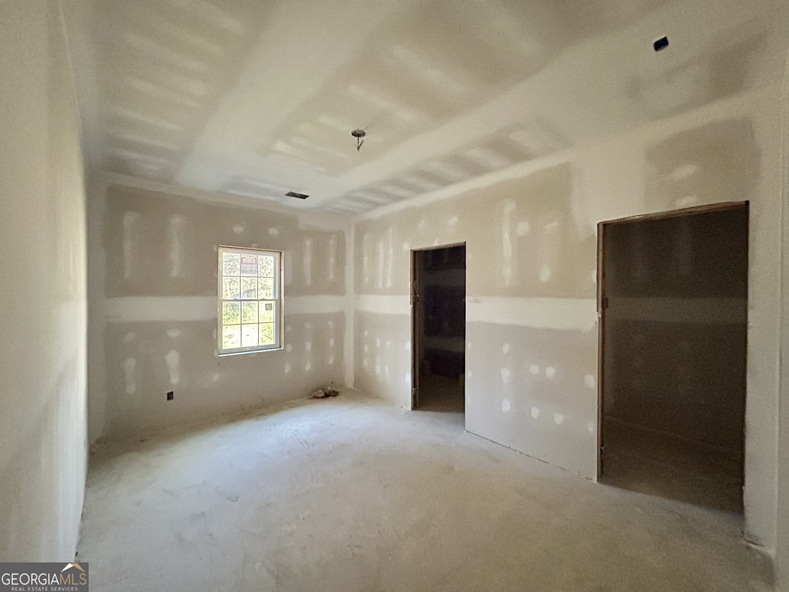 190 Cedar Pond Road Hartwell, GA 30643 - Photo 10 of 22 a view of an empty room with a window