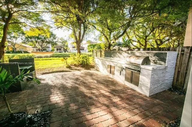 a view of a swimming pool with an outdoor space