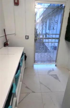 a view of balcony with wooden floor