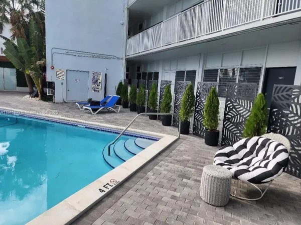 a view of outdoor space and swimming pool