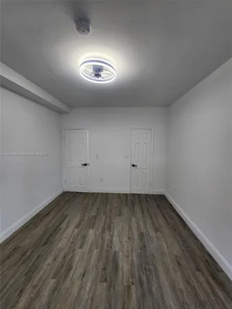 a view of a room with racks on the wall