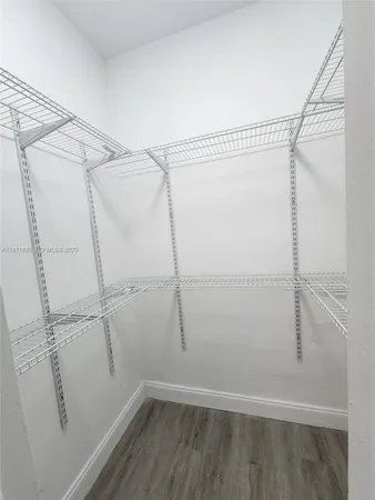 a bathroom with a tub and a sink