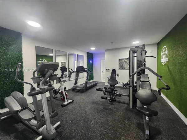 a view of a room with gym equipment