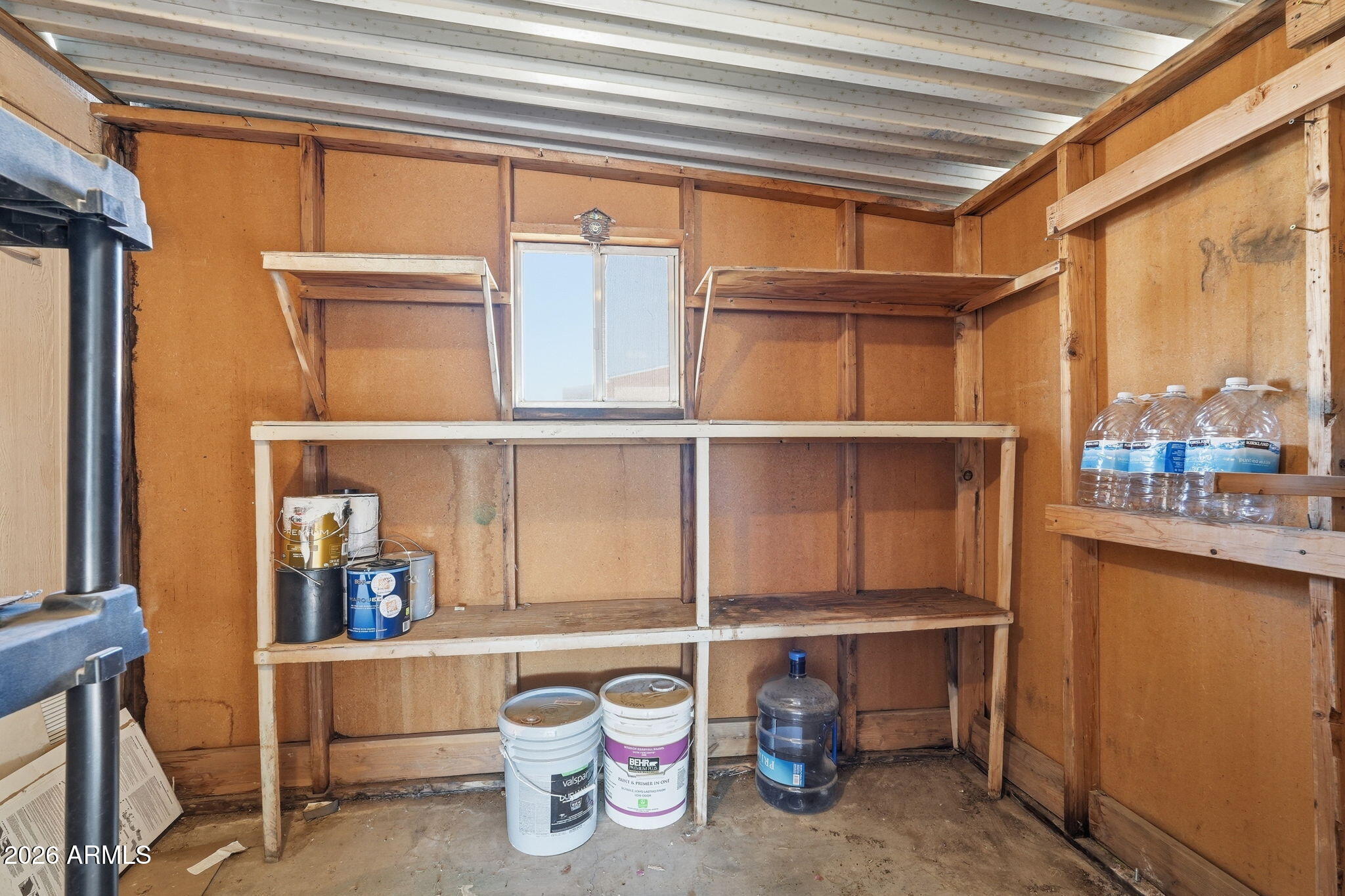 53 North Mountain Road, Unit 38 Apache Junction, AZ 85120 - Photo 29 of 35 a room with a wooden shelves and cabinets