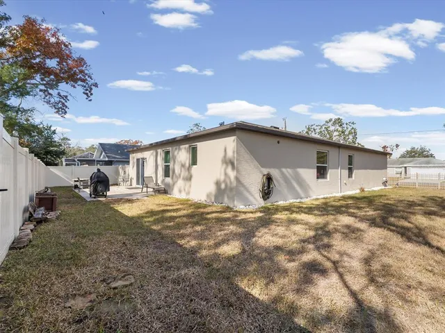 a view of parking garage with cars and other equipment