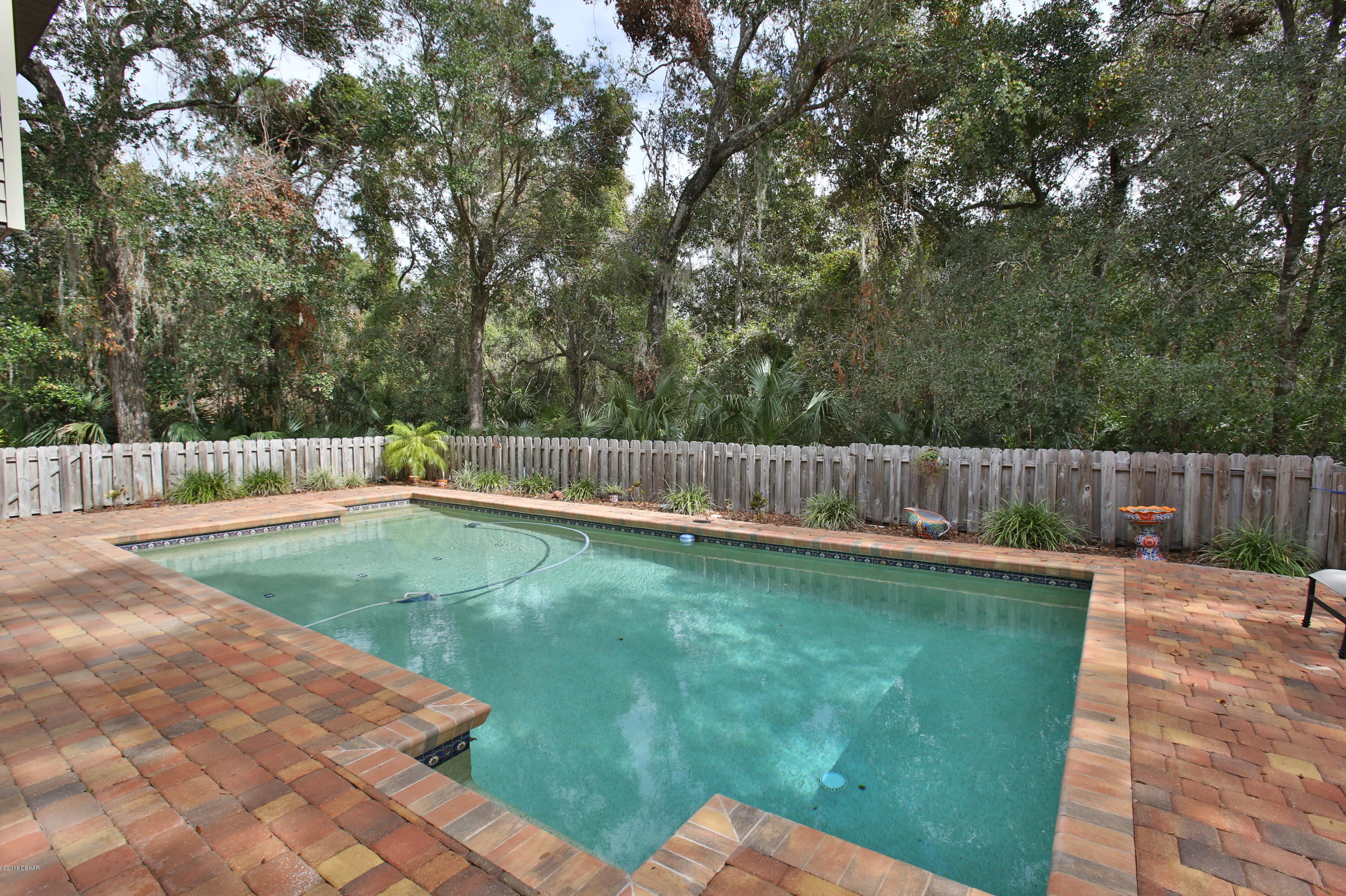 657 Needlerush Road Port Orange, FL 32127 - Photo 14 of 29 Chicago Brick Pavered Pool Area